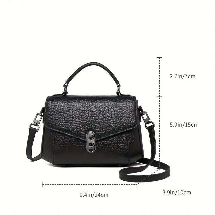 Borsa a tracolla nera in pelle, design elegante con manico superiore, chiusura a scatto, dimensioni 24x15x10 cm, ideale per moda femminile.