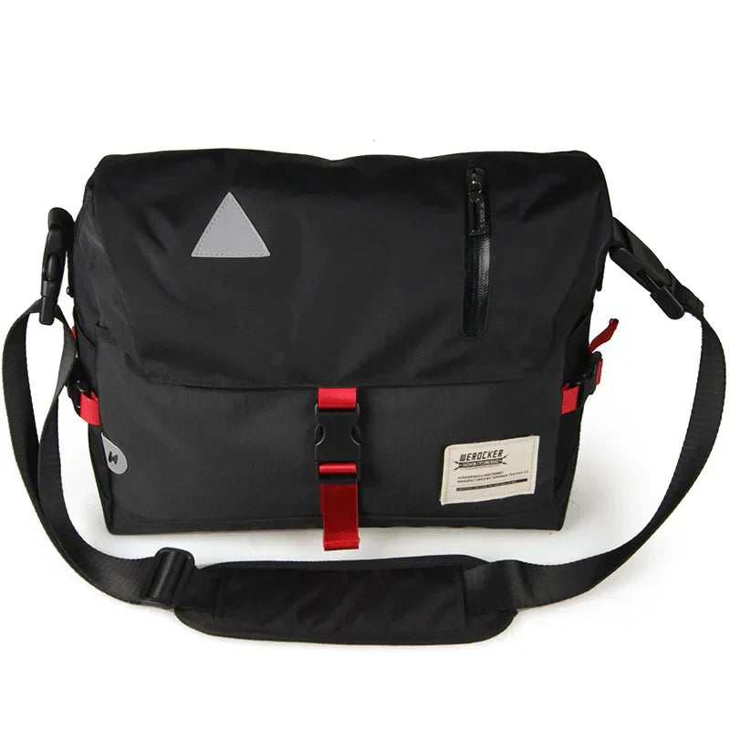 Borsa a tracolla nera unisex, design moderno, con dettagli rossi e tasca frontale con zip. Ideale per lavoro e viaggio. Accessorio moda pratico.