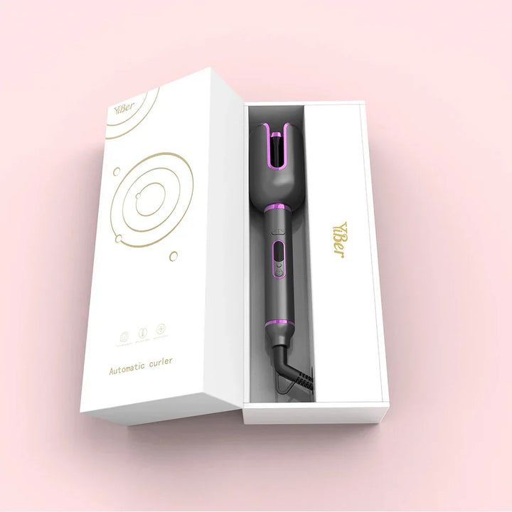 Arricciacapelli automatico nero e rosa in confezione elegante, design moderno, ideale per styling capelli, accessorio bellezza essenziale.