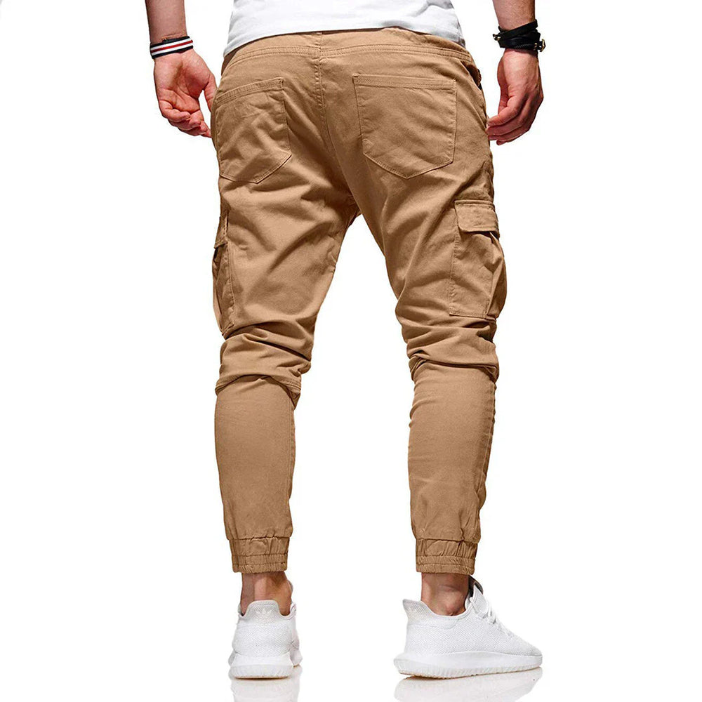 Pantaloni cargo uomo beige, tasche laterali, vestibilità slim, stile casual, cotone, elasticizzati, moda maschile, abbigliamento trendy.
