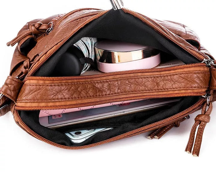 Borsa a mano elegante da donna, funzionale, in materiale morbido 1