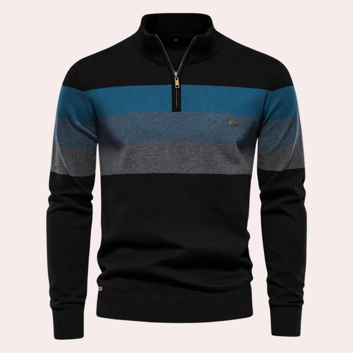 Maglione uomo a righe orizzontali blu, grigie e nere, con zip corta e colletto alto. Design elegante e moderno, ideale per l'autunno e l'inverno.