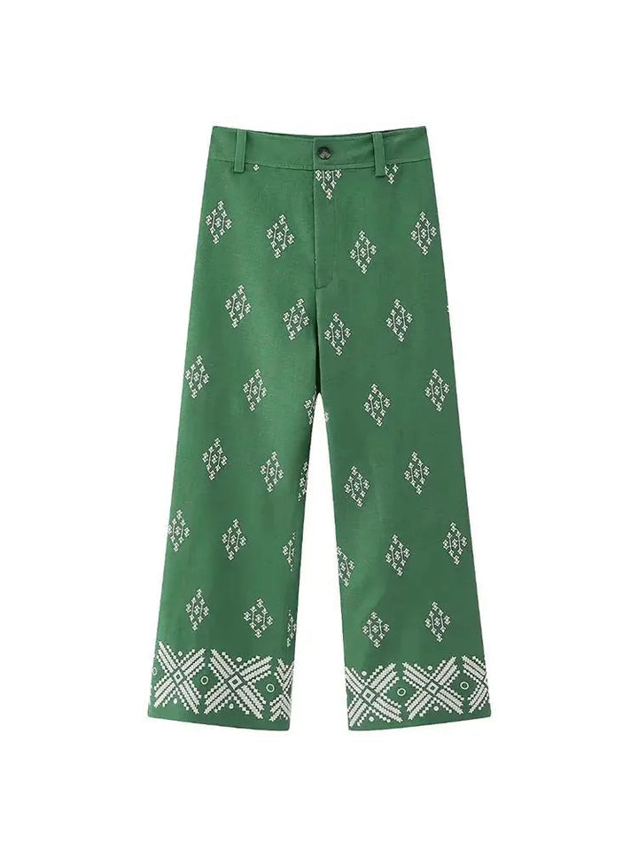 Pantaloni verdi a gamba larga con motivo geometrico bianco, stile casual, tessuto leggero, perfetti per moda estiva e look quotidiano.