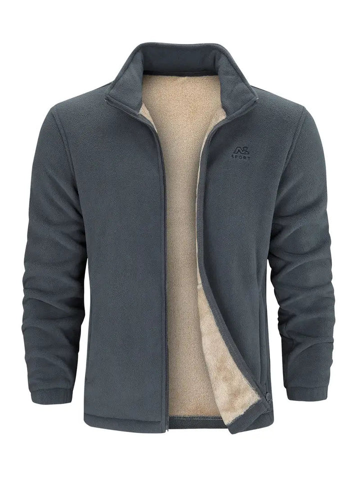 Giacca in pile grigio scuro da uomo, interno foderato in pelliccia sintetica beige, chiusura con zip, ideale per sport e outdoor.