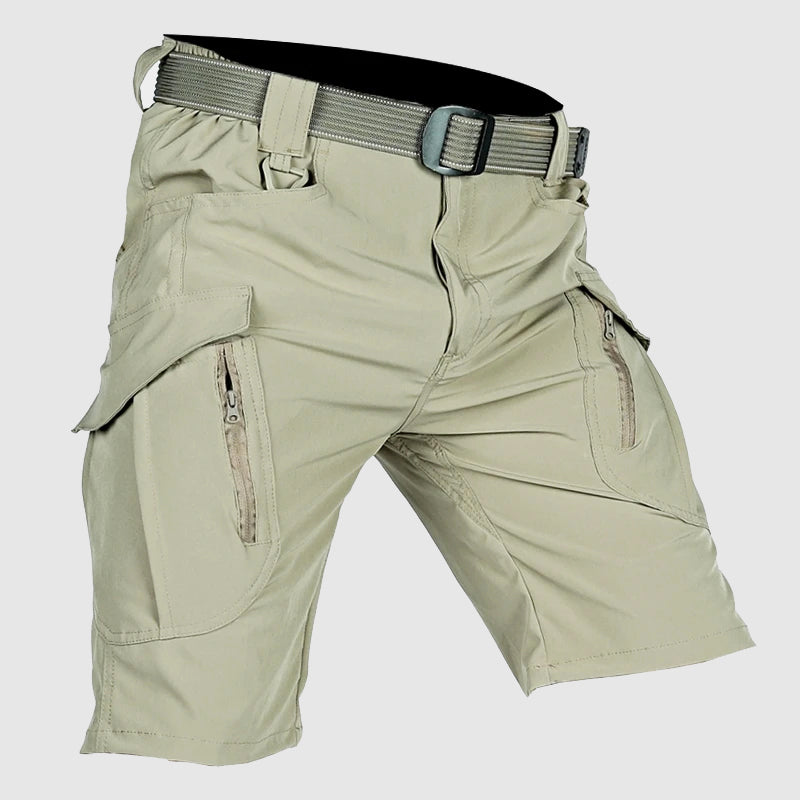 Pantaloncini cargo beige da uomo, tasche multiple con cerniera, cintura regolabile, design resistente, ideale per escursioni e attività all'aperto.
