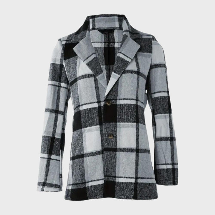 Giacca a quadri bianco e nero, stile casual, tessuto invernale, chiusura a bottoni, design moderno, ideale per moda autunnale e invernale.