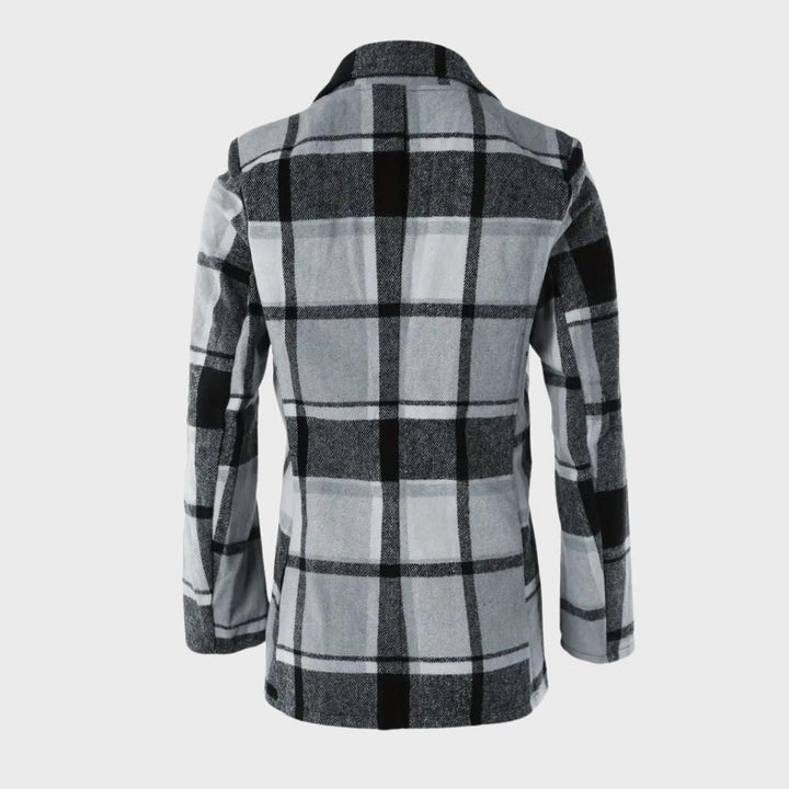 Cappotto a quadri grigio e nero da uomo, elegante e moderno, ideale per l'inverno. Design a scacchi, tessuto caldo e confortevole.