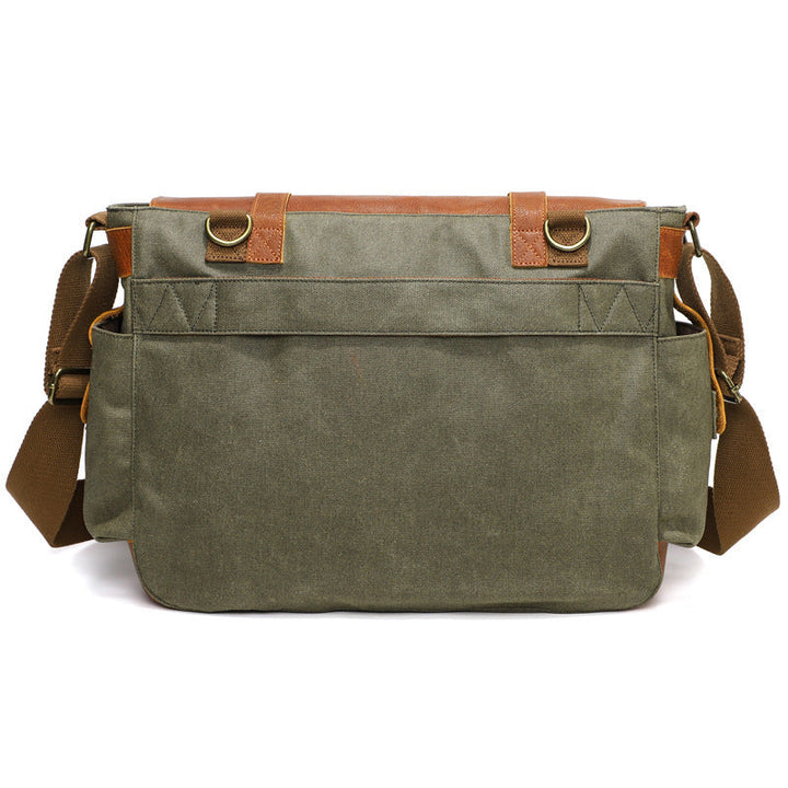 Borsa a tracolla in tela verde oliva con dettagli in pelle marrone, tasche multiple, design resistente, ideale per lavoro e viaggio.