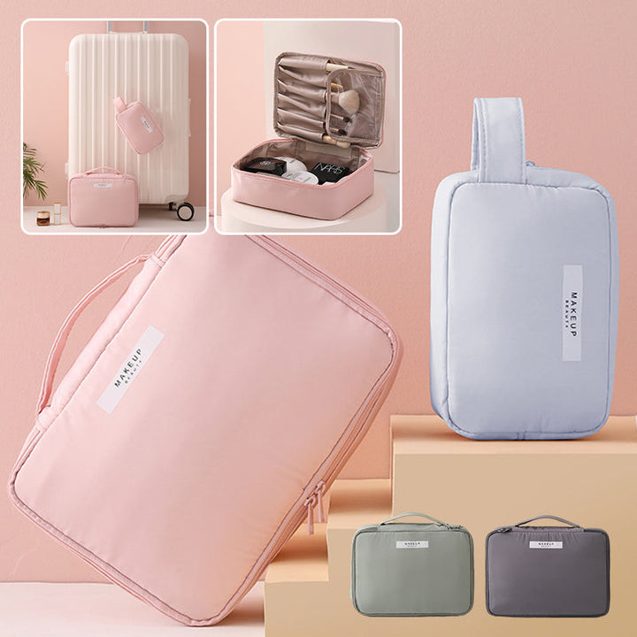 Set di borse da viaggio organizer in tessuto rosa e grigio, ideali per cosmetici e accessori. Design compatto, perfetto per valigie e bagagli a mano.