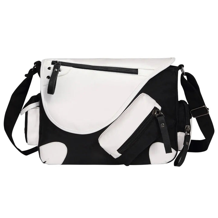 Borsa a tracolla bianca e nera con tasche multiple e cerniere, design moderno, ideale per uso quotidiano e viaggi. Accessorio moda unisex.