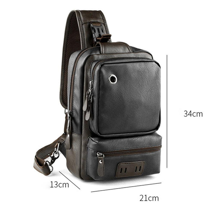 Zaino a tracolla in pelle nera, dimensioni 34x21x13 cm, con tasche multiple e porta USB. Design elegante e funzionale per uomo e donna.