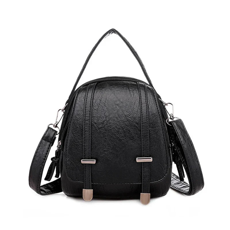 Zaino in pelle nera elegante con cinghie regolabili, design moderno e chiusura a zip. Perfetto per moda donna, accessori casual e viaggi.