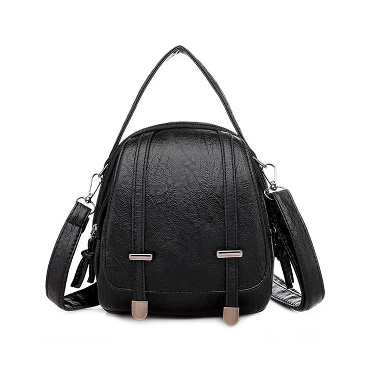 Zaino in pelle nera elegante con cinghie regolabili, design moderno e chiusura a zip. Perfetto per moda donna, accessori casual e viaggi.