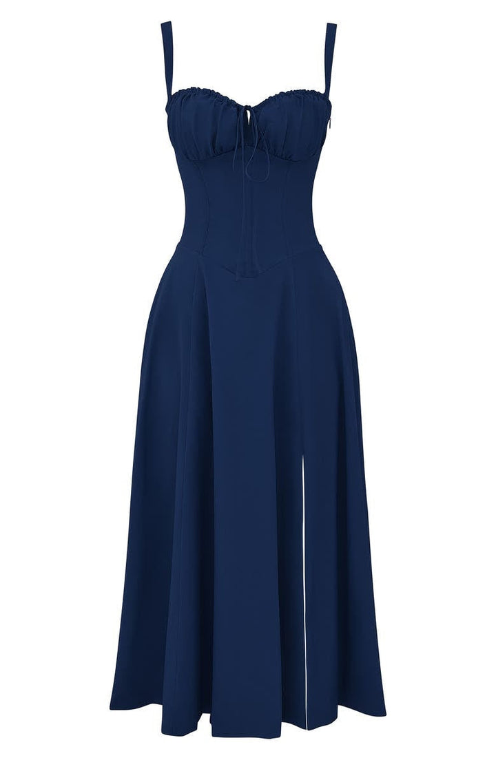 Abito lungo blu scuro con spalline sottili, scollo a cuore e gonna ampia. Elegante e femminile, perfetto per eventi serali e cerimonie.