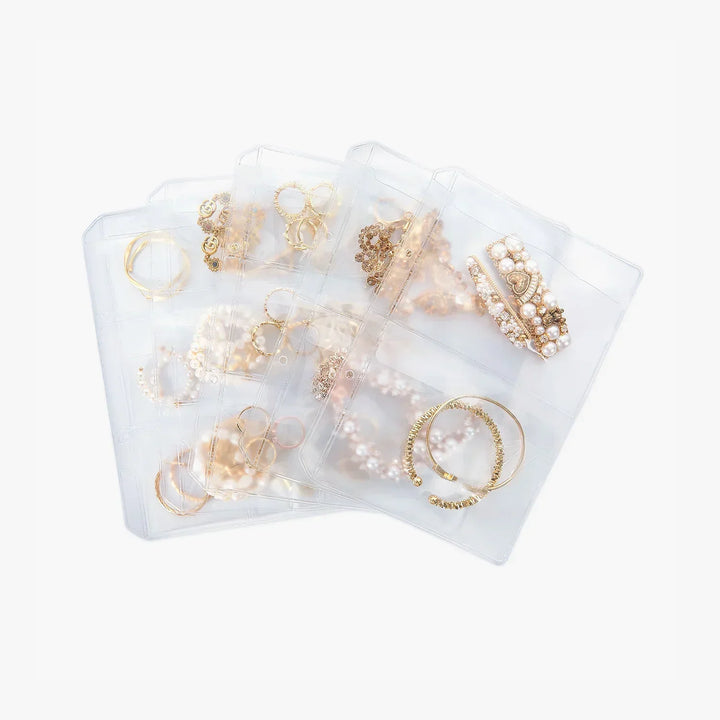 Contenitori trasparenti per gioielli con scomparti multipli, ideali per organizzare bracciali, anelli e collane. Soluzione pratica per conservare accessori.
