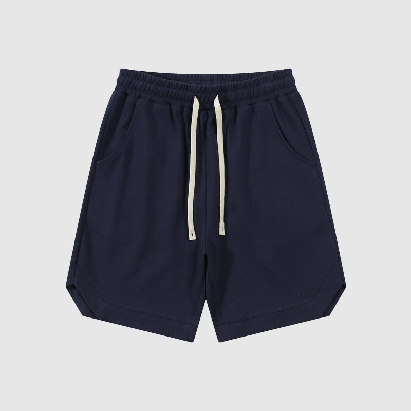 Pantaloncini sportivi blu navy da uomo con coulisse, tasche laterali, design casual, perfetti per attività sportive e tempo libero.