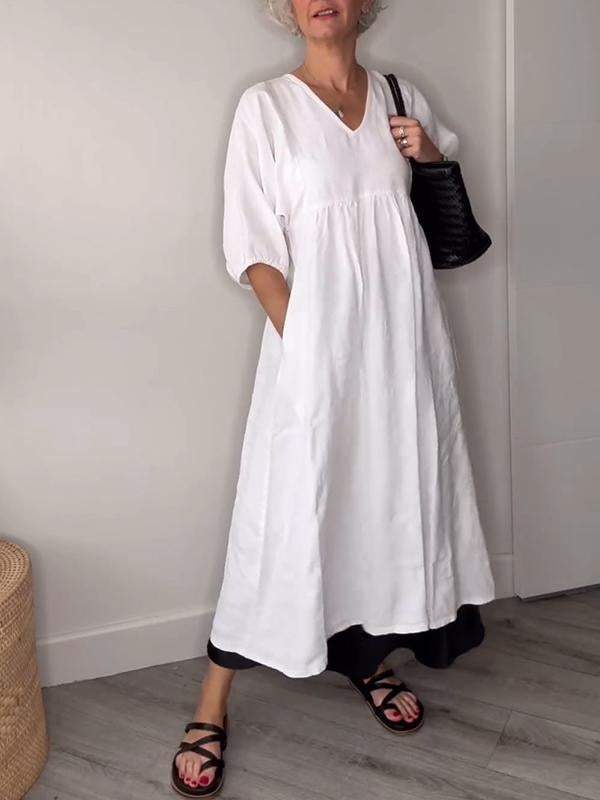 Klara | Abito midi con scollo a V e design elegante 3