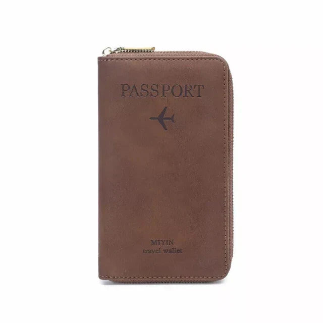 Portafoglio da viaggio in pelle marrone con cerniera, design per passaporto, logo aereo, ideale per viaggiatori, elegante e funzionale.