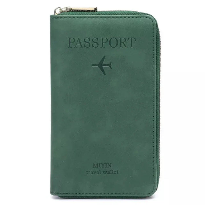 Portafoglio da viaggio verde in pelle con cerniera, design per passaporto, logo aereo, ideale per organizzare documenti e carte durante i viaggi.