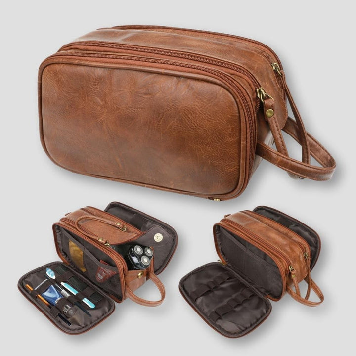 Borsello da viaggio in pelle marrone con cerniere dorate, scomparti multipli e tasche interne, ideale per organizzare accessori e articoli da toeletta.