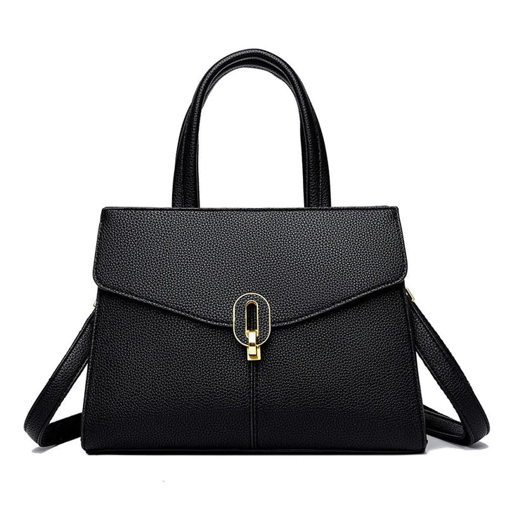 Borsa a mano in pelle nera elegante con chiusura dorata, design moderno, ideale per donna, accessorio moda, perfetta per ogni occasione.