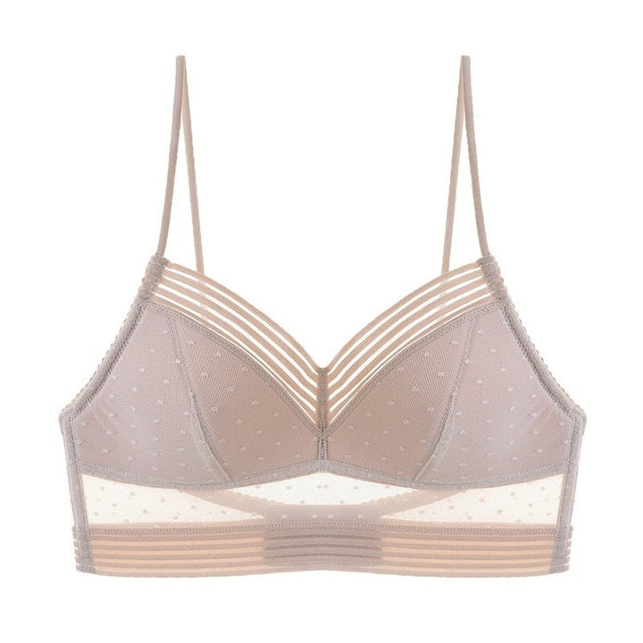 Reggiseno bralette trasparente beige con spalline sottili, design a pois, senza ferretto. Intimo femminile elegante e confortevole.