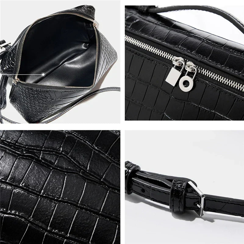 Borsa a tracolla nera in pelle effetto coccodrillo, con zip argentata e dettagli interni spaziosi. Cinturino regolabile. Elegante e versatile.