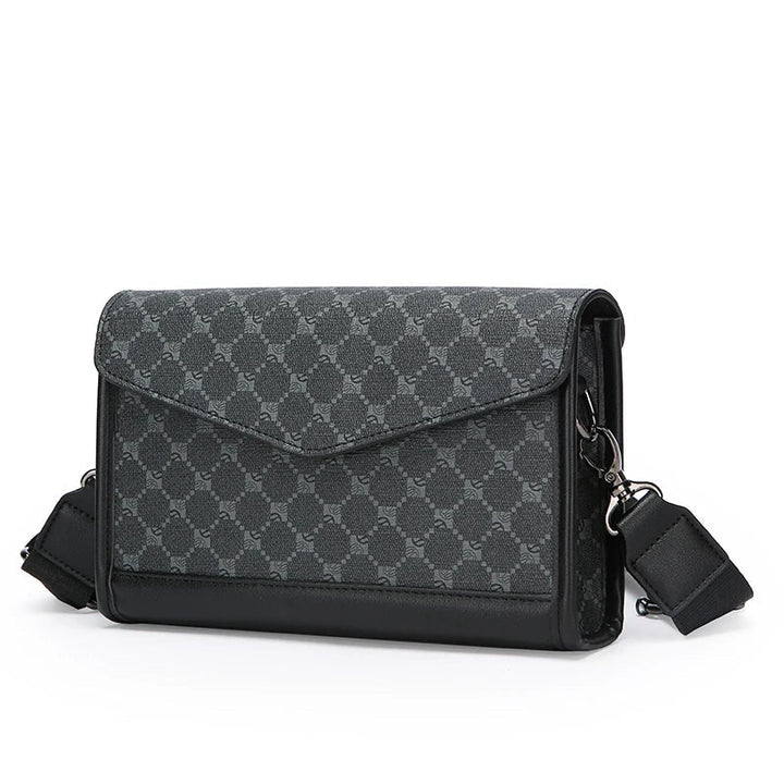 Borsa a tracolla nera in pelle con motivo geometrico, chiusura a patta, tracolla regolabile. Elegante accessorio moda per uomo e donna.