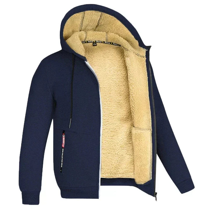 Giacca felpata con cappuccio blu scuro, interno in pelliccia sintetica beige, zip frontale, tasche laterali, ideale per l'inverno.