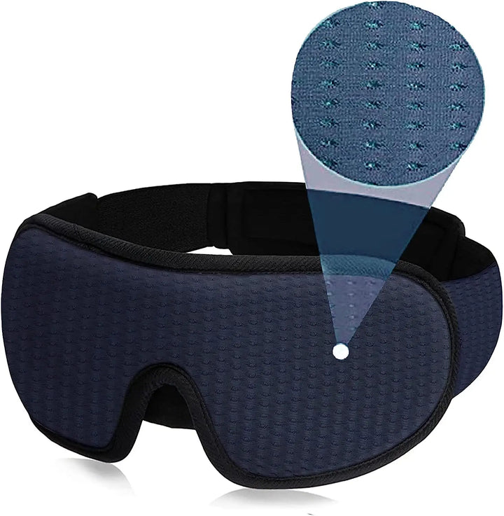 Maschera per dormire in memory foam blu scuro, design ergonomico, traspirante, con dettaglio tessuto a nido d'ape, ideale per viaggi e relax.