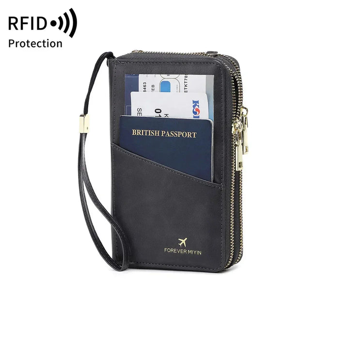 Portafoglio da viaggio nero con protezione RFID, tasche per passaporto britannico e carte di credito, chiusura a zip, design compatto ed elegante.