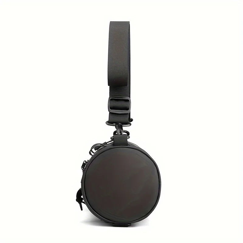 Borsa a tracolla rotonda nera unisex, design moderno, cinturino regolabile, chiusura con zip, ideale per moda urbana e viaggi.