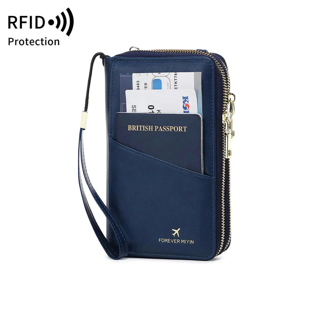 Portafoglio da viaggio blu con protezione RFID, tasca per passaporto britannico, slot per carte di credito e cerniera. Accessorio sicuro e pratico.
