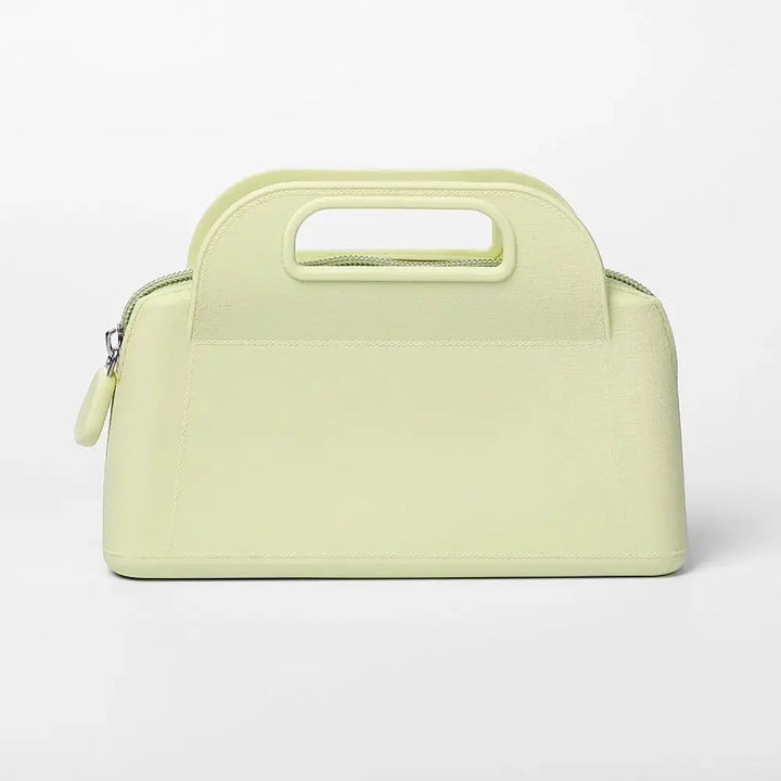 Borsa a mano in pelle verde chiaro con manico integrato, design elegante e moderno, perfetta per moda donna, accessorio di lusso.