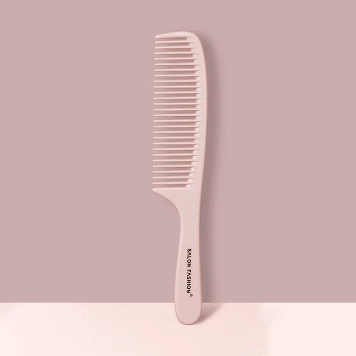Pettine rosa in plastica con denti larghi, ideale per capelli ricci o mossi. Design ergonomico, marchio "Salon Fashion". Accessorio per styling capelli.