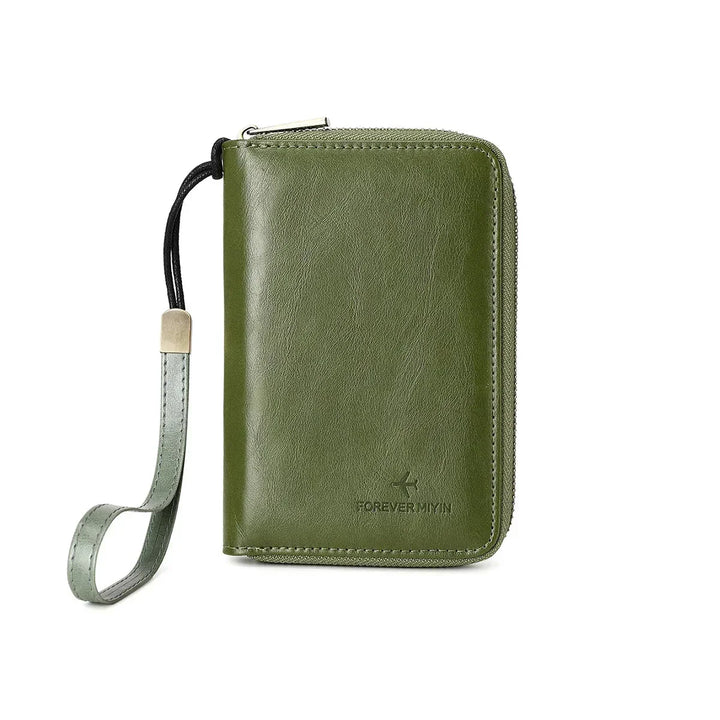 Portafoglio in pelle verde con cerniera e cinturino da polso, design elegante e compatto, ideale per uomo e donna. Accessorio moda di tendenza.