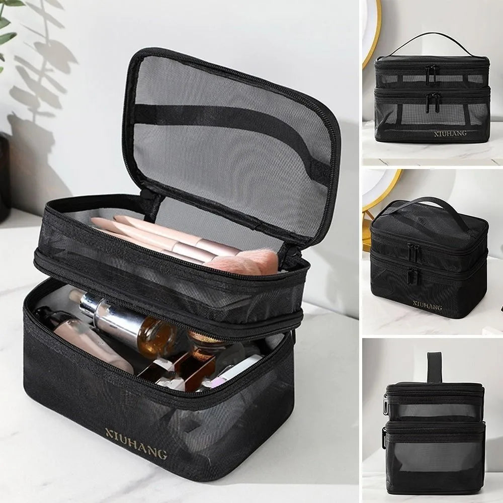 Borsa trucco nera a due scomparti con cerniera, trasparente, ideale per cosmetici e accessori da viaggio. Design compatto e pratico.