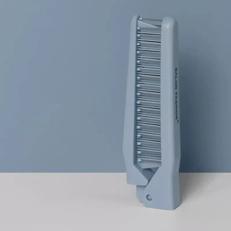 Pettine pieghevole blu per capelli, design compatto, ideale per viaggi e uso quotidiano. Accessorio moda capelli, pratico e portatile.