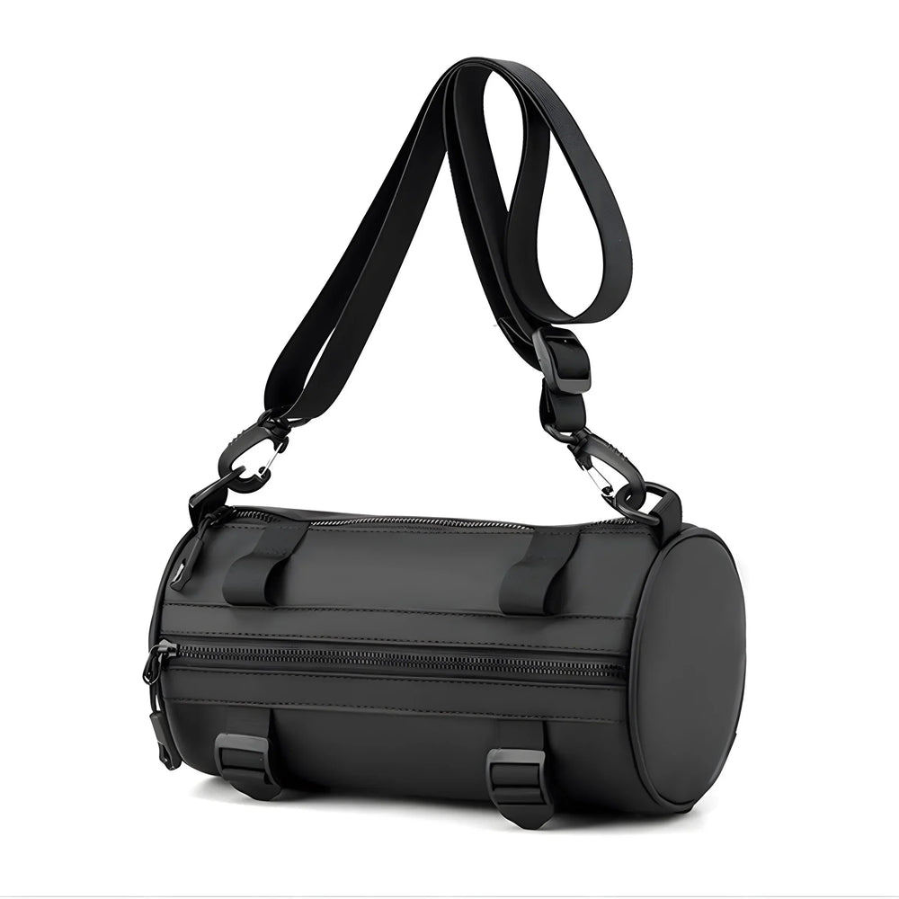Borsa a tracolla cilindrica nera in pelle, design moderno, con cerniera e fibbie regolabili. Accessorio moda unisex, ideale per viaggi e uso quotidiano.