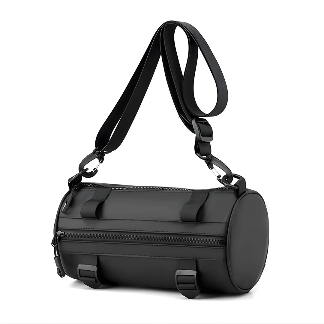 Borsa a tracolla cilindrica nera in pelle, design moderno, con cerniera e fibbie regolabili. Accessorio moda unisex, ideale per viaggi e uso quotidiano.
