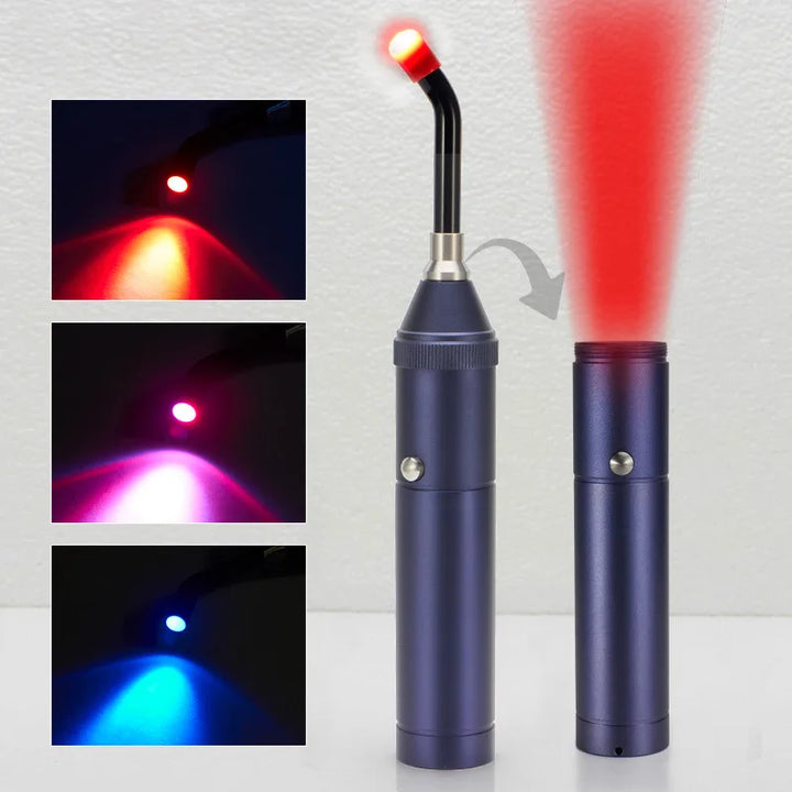 Torcia LED dentale blu con luce rossa, blu e viola, design ergonomico, ideale per studi dentistici. Accessorio professionale per odontoiatria.