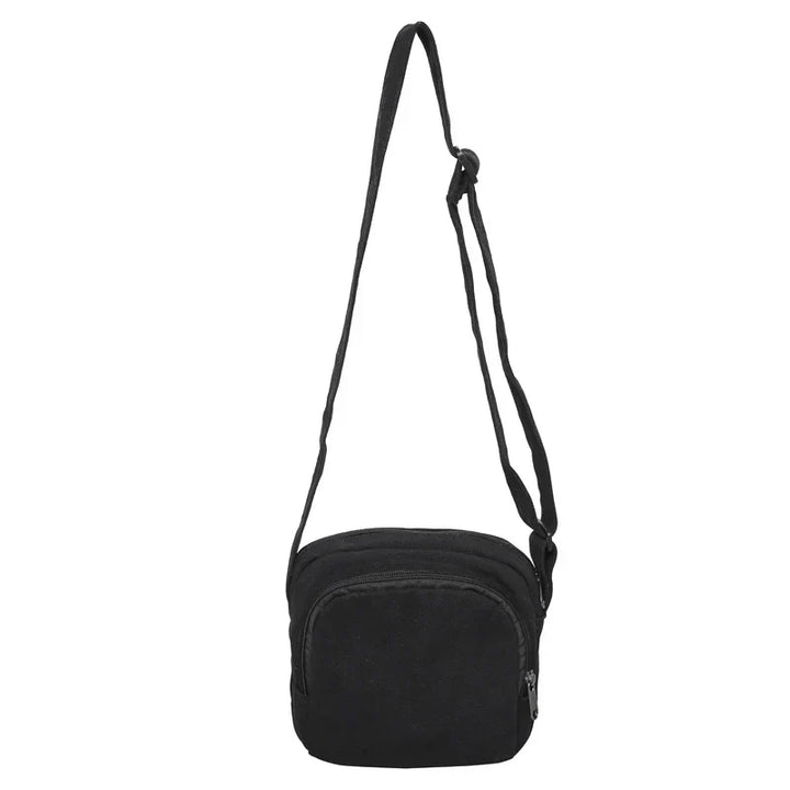 Borsa a tracolla nera in tessuto, design compatto con cerniera, ideale per uomo e donna. Accessorio moda pratico e versatile.