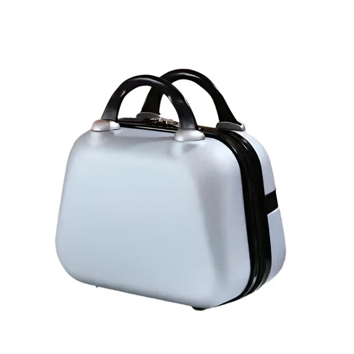 Valigia rigida argentata con manici neri, design compatto e moderno, ideale per viaggi brevi. Bagaglio a mano elegante e resistente.
