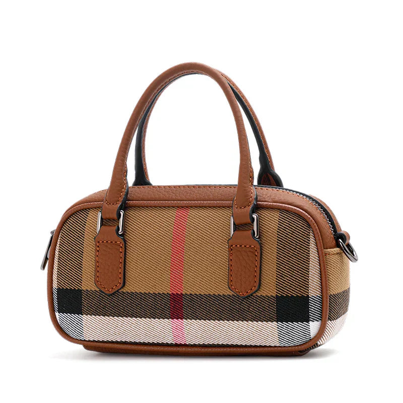 Borsa a mano in pelle marrone con motivo a quadri, design elegante e compatto, ideale per moda donna. Accessorio di tendenza per ogni occasione.