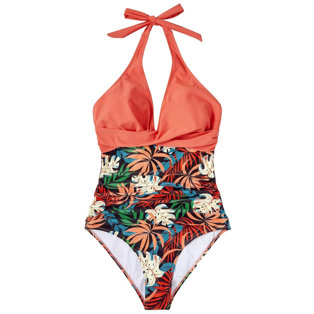 Costume intero donna tropicale, scollo all'americana, stampa foglie colorate, design elegante, perfetto per spiaggia e piscina.