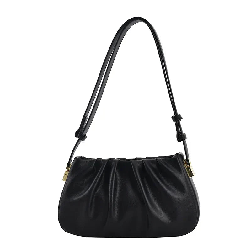 Borsa a spalla nera in pelle, design elegante con pieghe, chiusura a zip, tracolla regolabile, accessorio moda donna, stile contemporaneo.