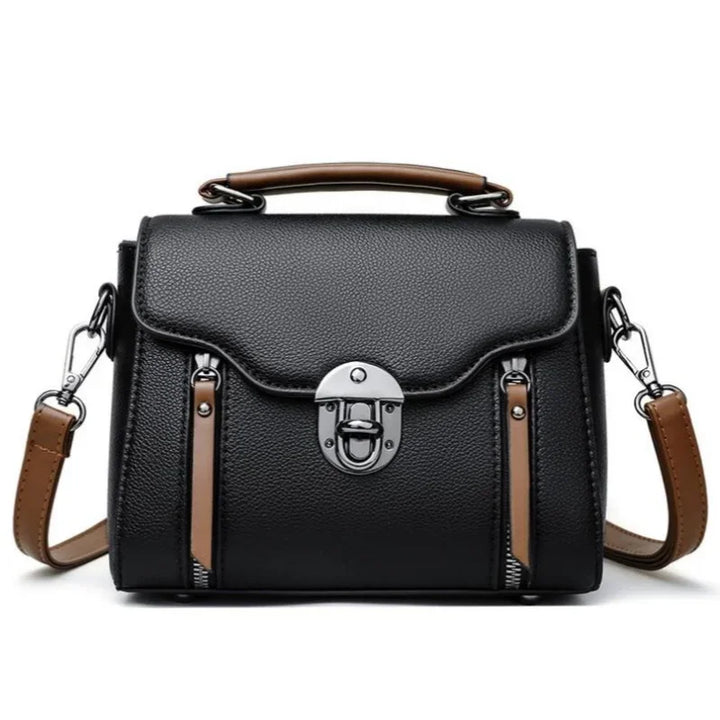 Borsa a tracolla in pelle nera con manico marrone, chiusura a scatto in metallo, design elegante e moderno, ideale per moda donna.