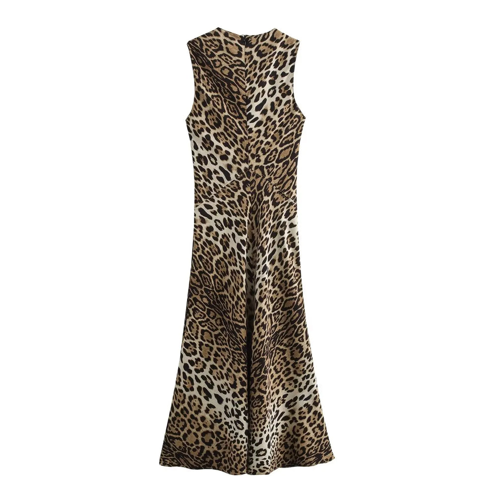 Abito lungo senza maniche con stampa leopardata, elegante e alla moda, perfetto per occasioni speciali. Tessuto leggero e design moderno.