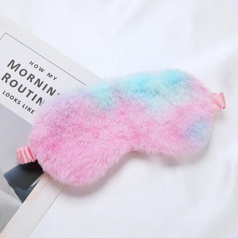 Maschera per dormire in peluche rosa e azzurro, morbida e confortevole, ideale per il relax e il sonno. Accessorio perfetto per la routine mattutina.