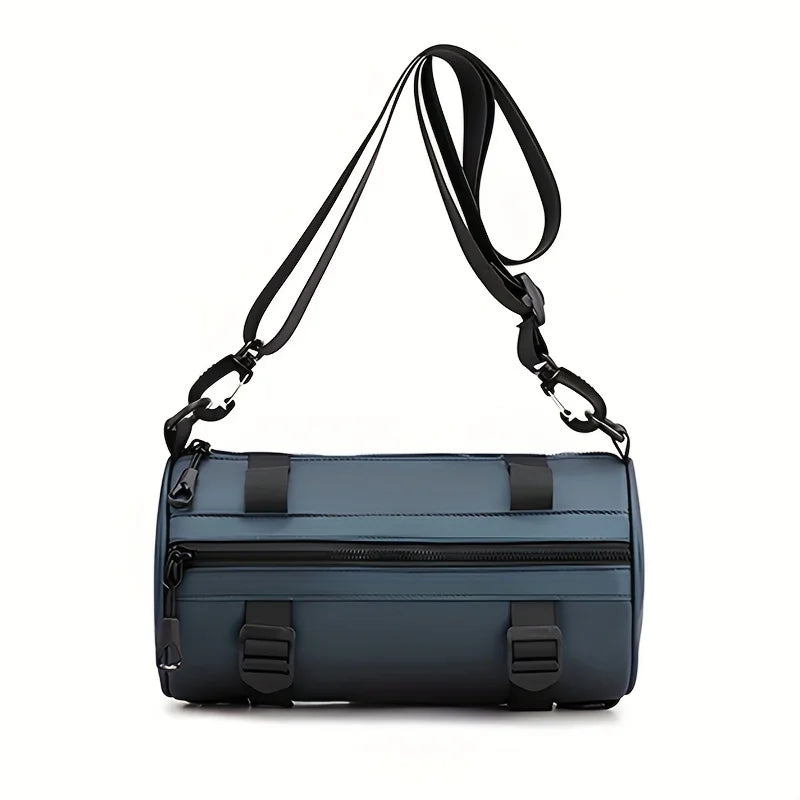 Borsa a tracolla cilindrica blu, design moderno, con cinghie regolabili e tasche con zip. Accessorio moda unisex, ideale per viaggi e sport.